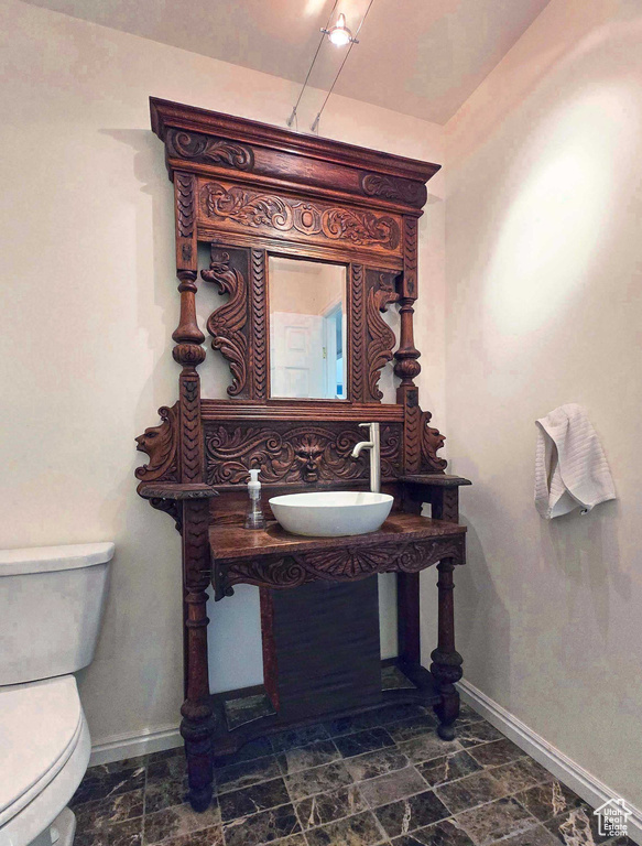 Bathroom with toilet and sink