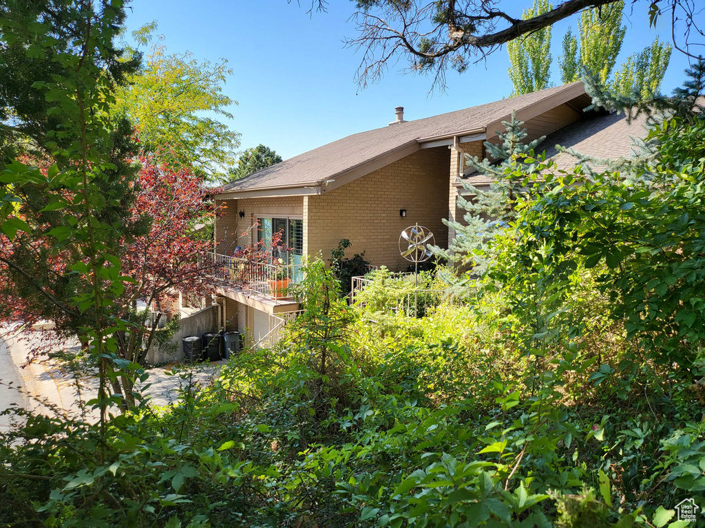 View of property exterior with central AC