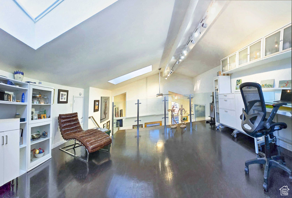 Interior space featuring wood-type flooring and rail lighting