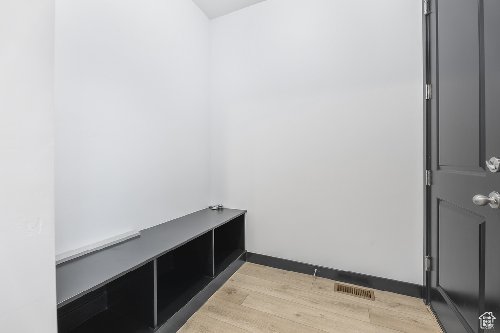 Mudroom featuring light wood-type flooring