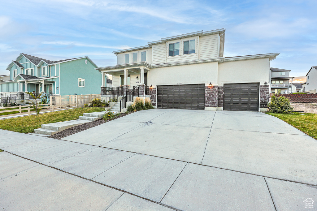 View of front facade with a garage