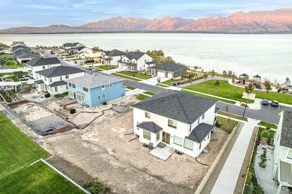 Aerial view with a water and mountain view