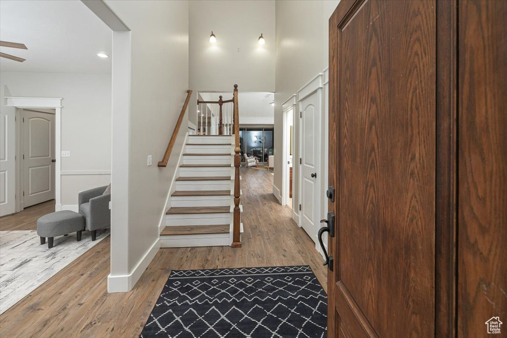 Foyer featuring ceiling fan and light hardwood / wood-style floors