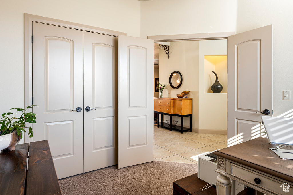 Interior space with light tile patterned floors