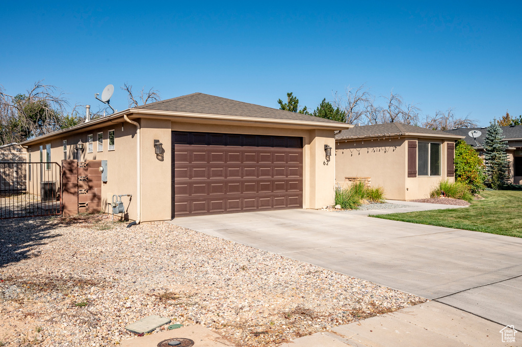 Single story home with a garage