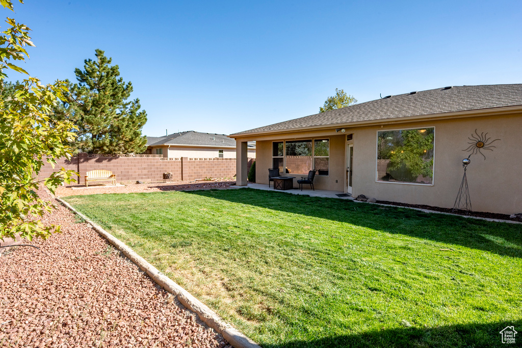 View of yard with a patio