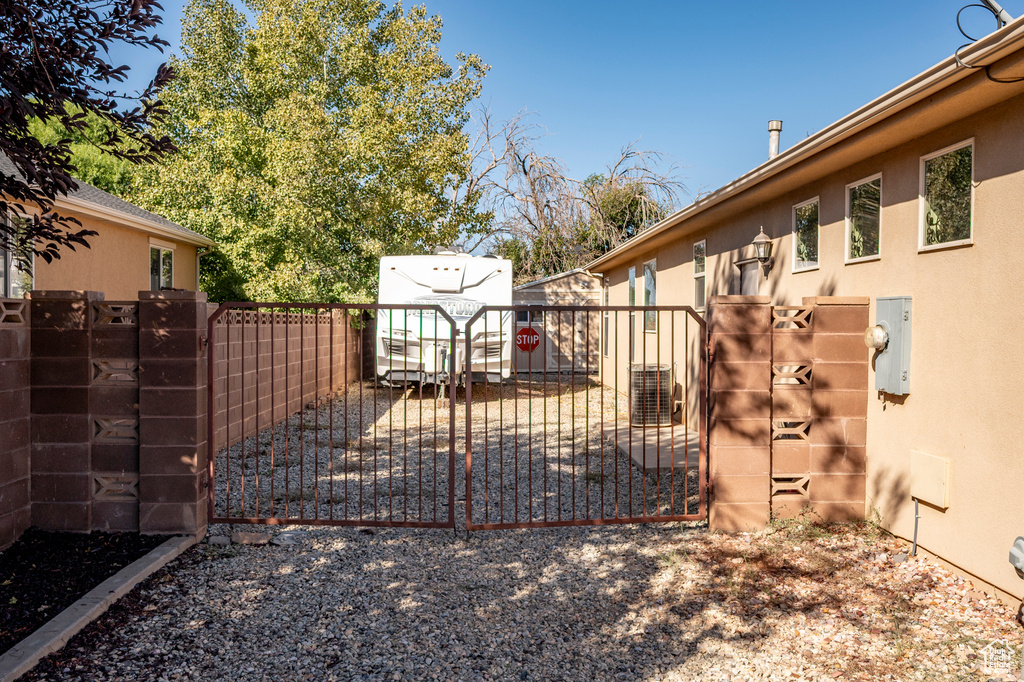 View of gate featuring central AC unit