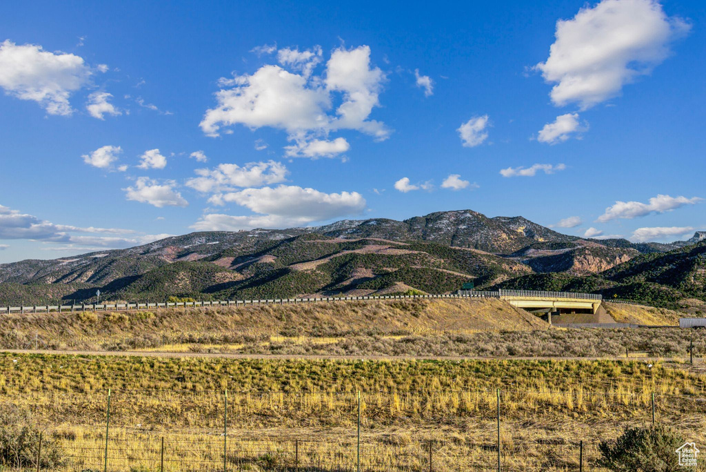 View of mountain feature with a rural view