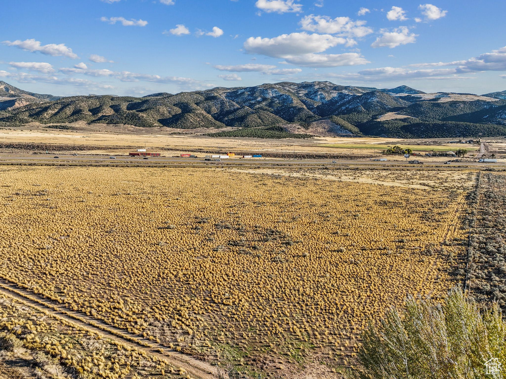 Property view of mountains featuring a rural view