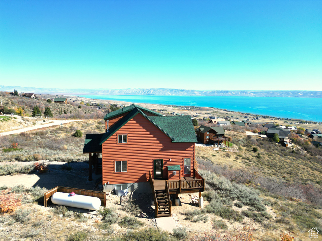 Exterior space with a deck with mountain view