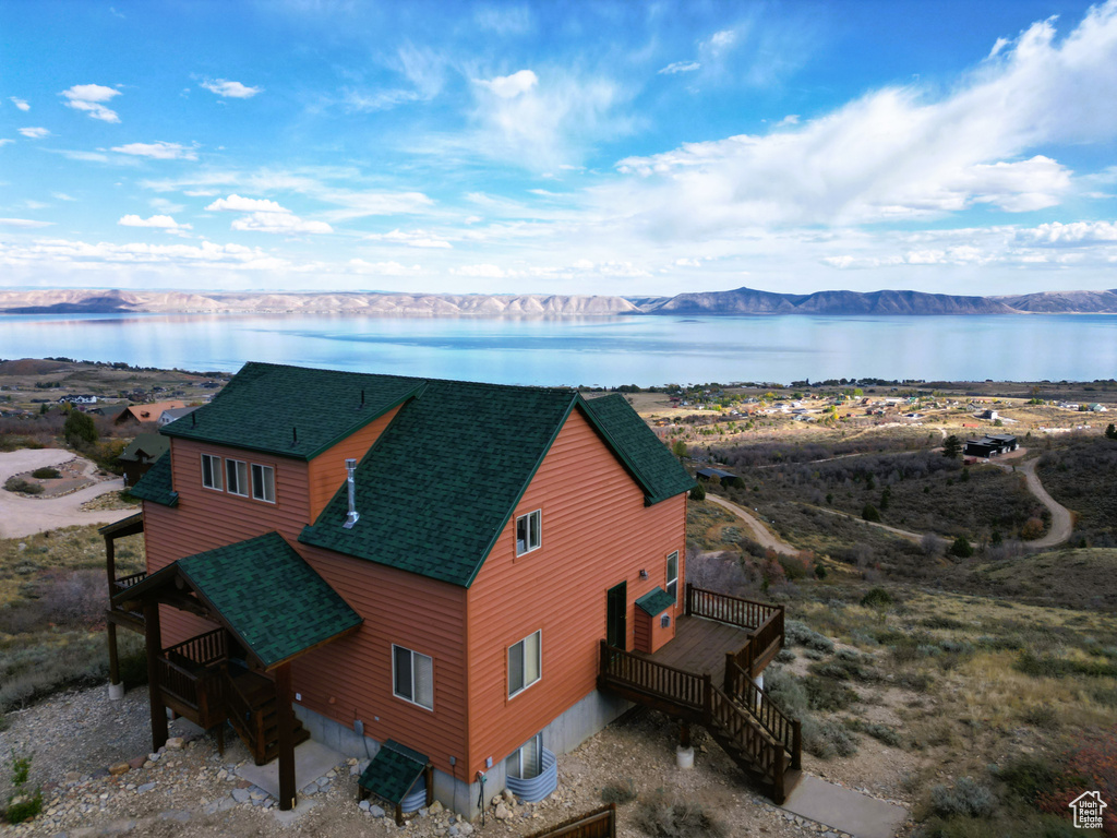 Bird's eye view with a water and mountain view