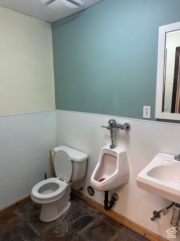 Bathroom featuring sink and toilet