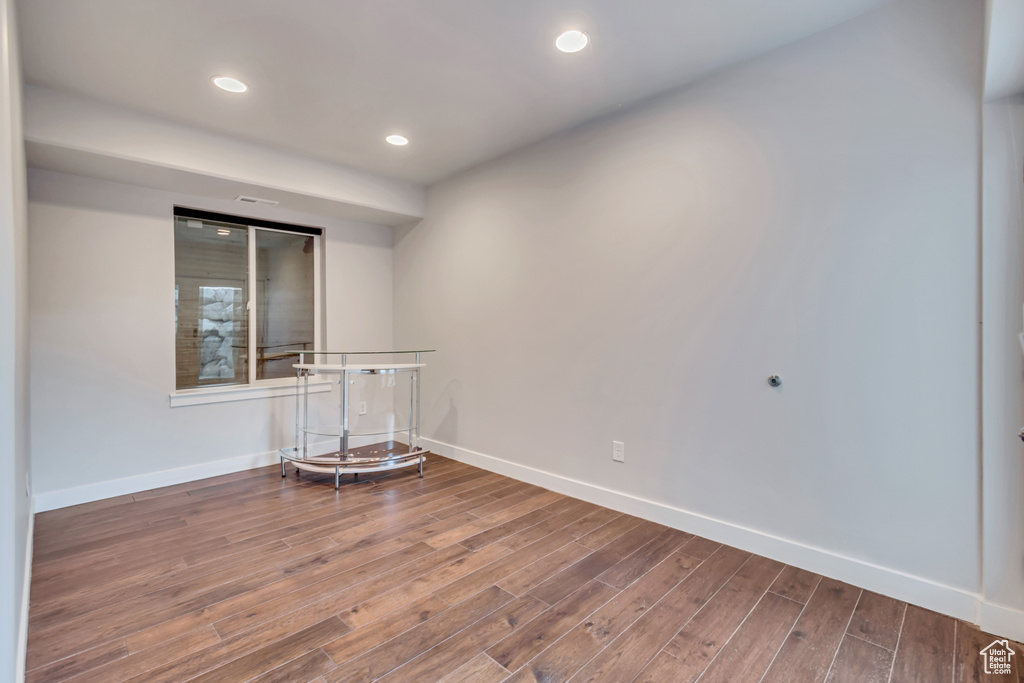 Unfurnished room featuring hardwood / wood-style flooring