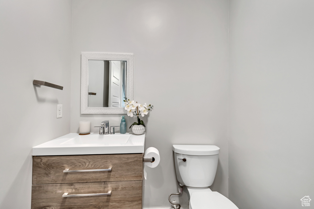 Bathroom with vanity and toilet