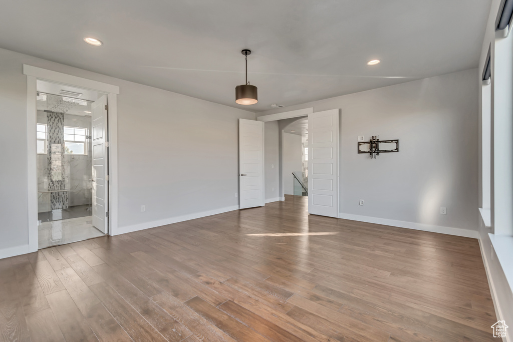 Empty room featuring hardwood / wood-style flooring