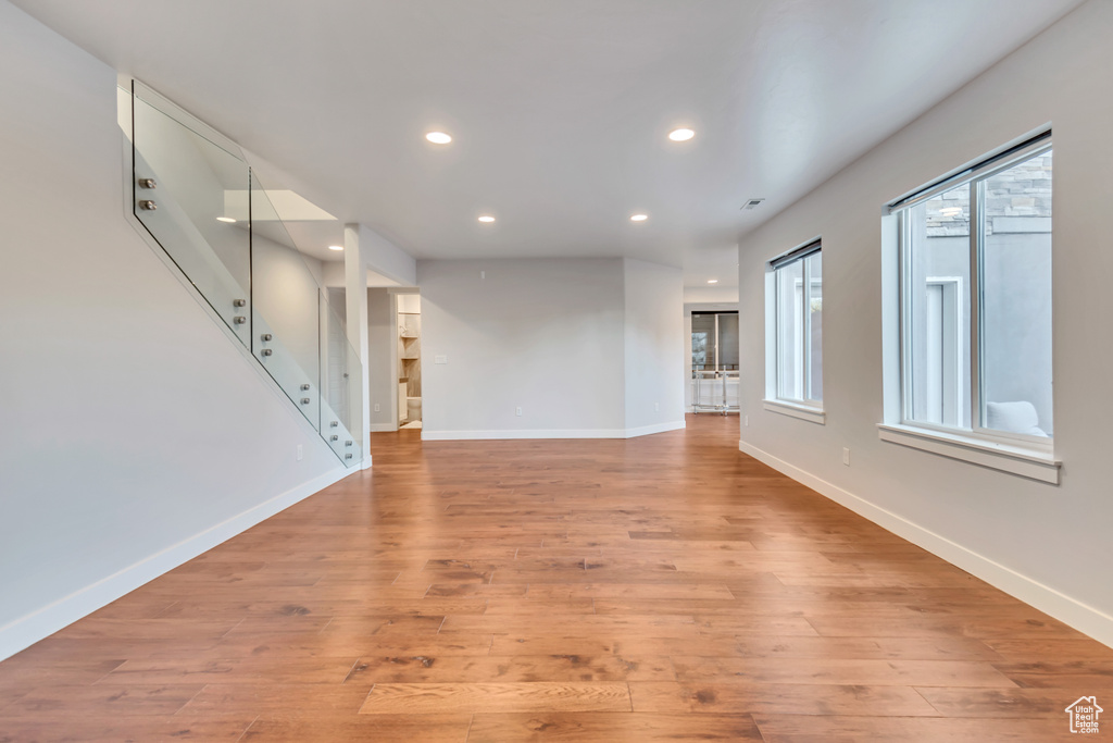 Unfurnished living room with light wood-type flooring