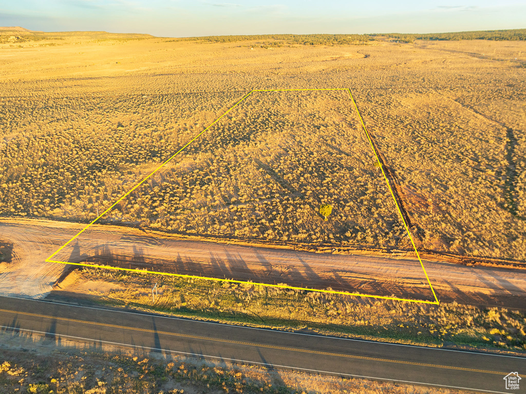 Birds eye view of property featuring a rural view