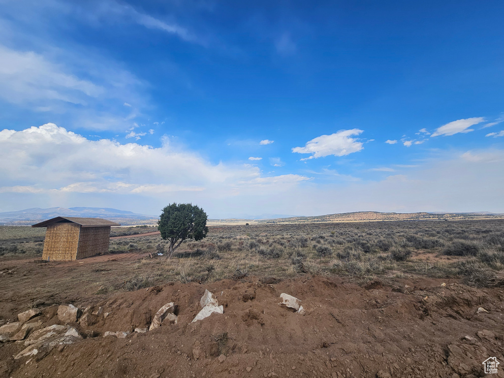 View of mountain feature with a rural view