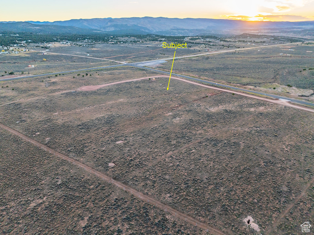 Aerial view at dusk with a mountain view