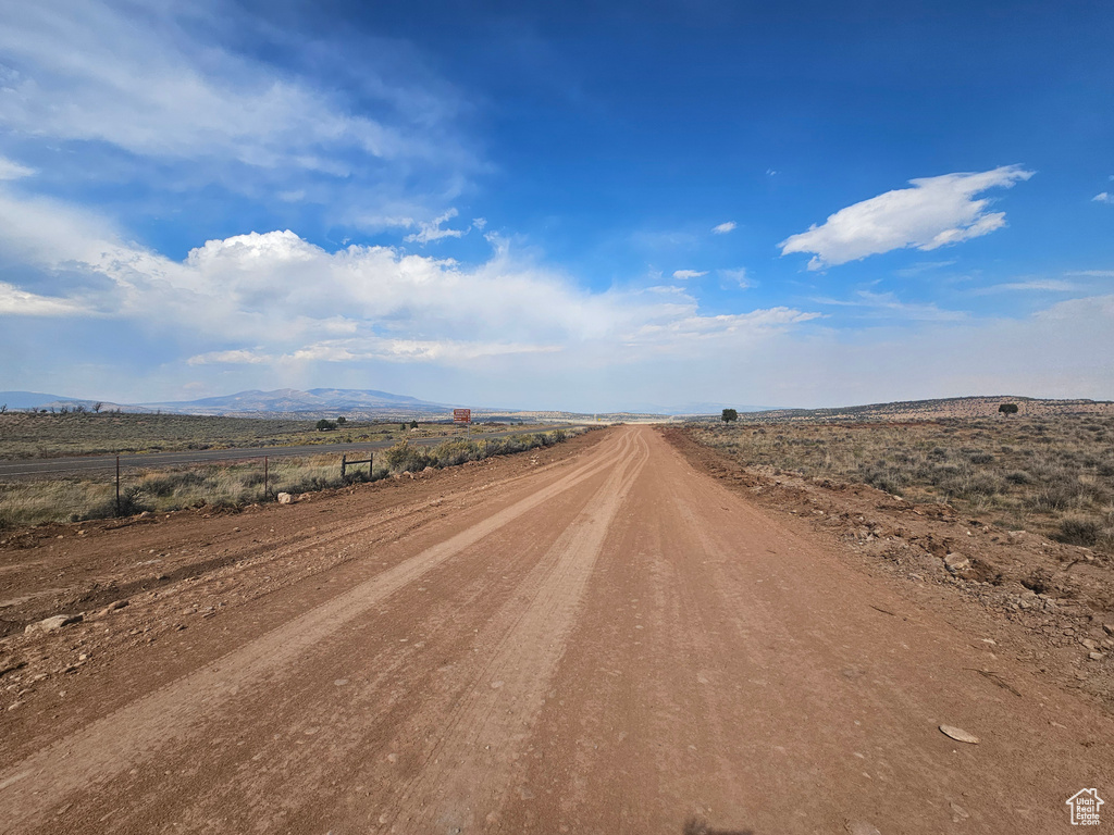 View of road featuring a rural view and a mountain view