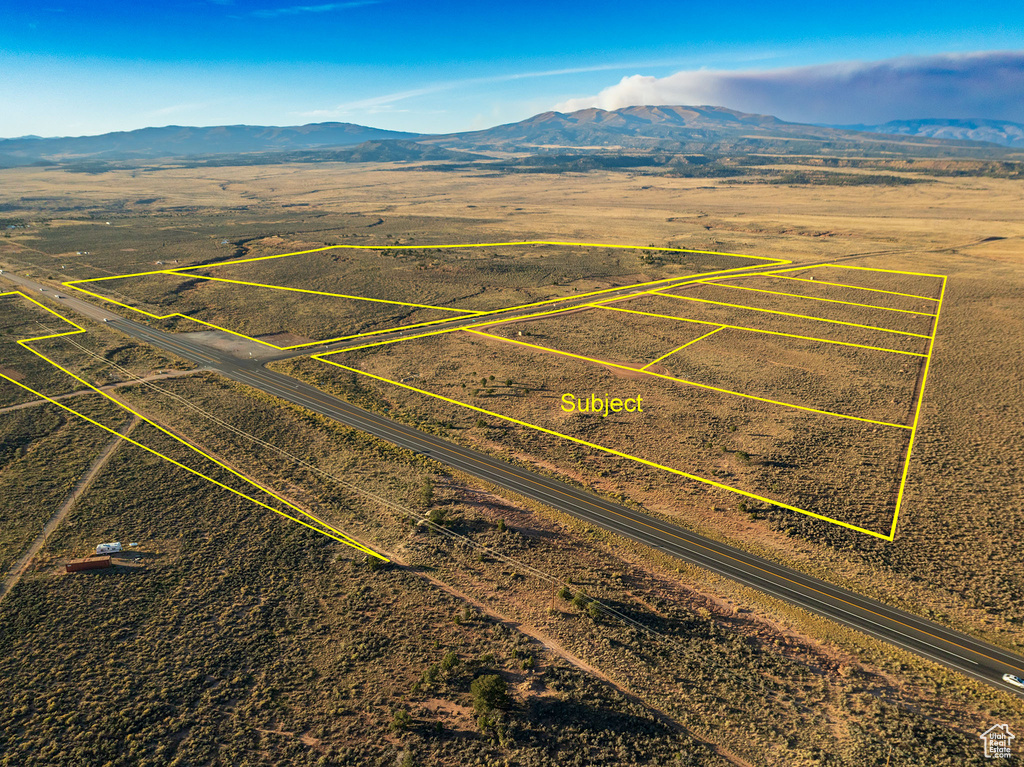 Drone / aerial view featuring a mountain view