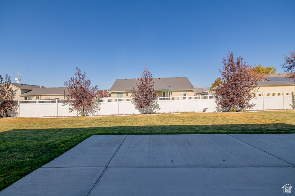 View of yard with a patio area