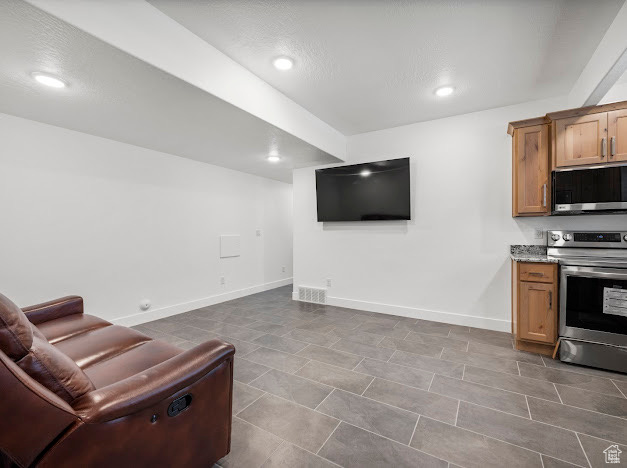 View of tiled living room