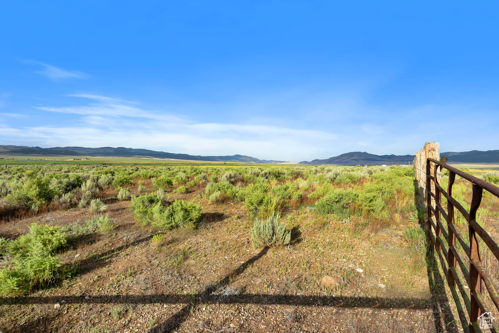 Property view of mountains featuring a rural view