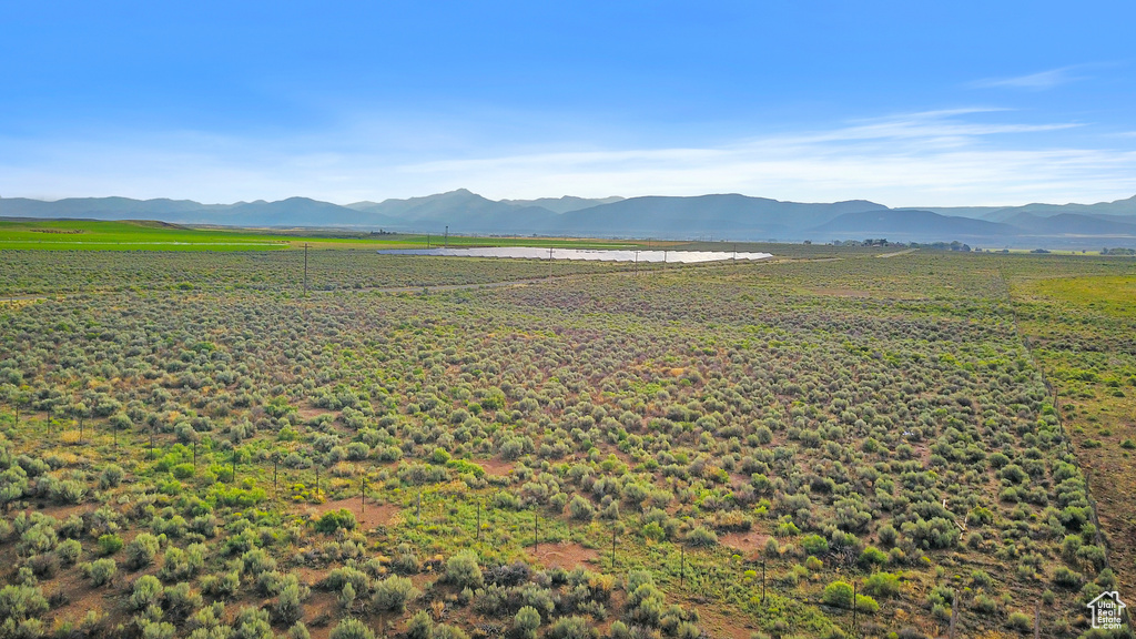 Property view of mountains with a rural view