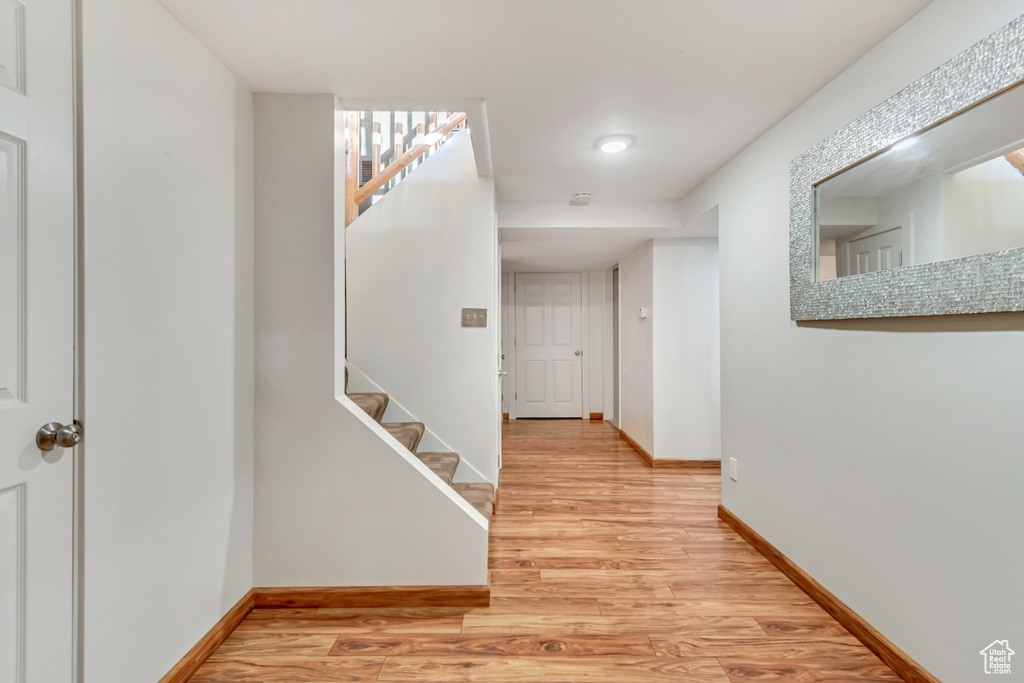 Hallway featuring light hardwood / wood-style floors