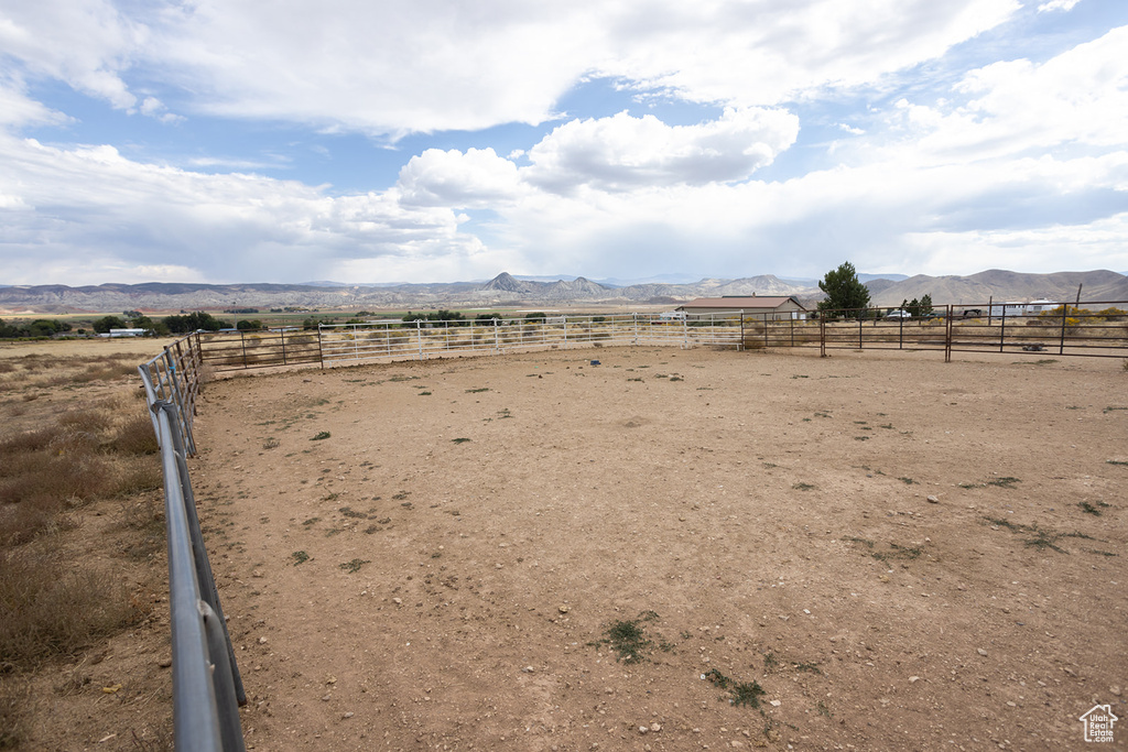 View of yard featuring a mountain view and a rural view