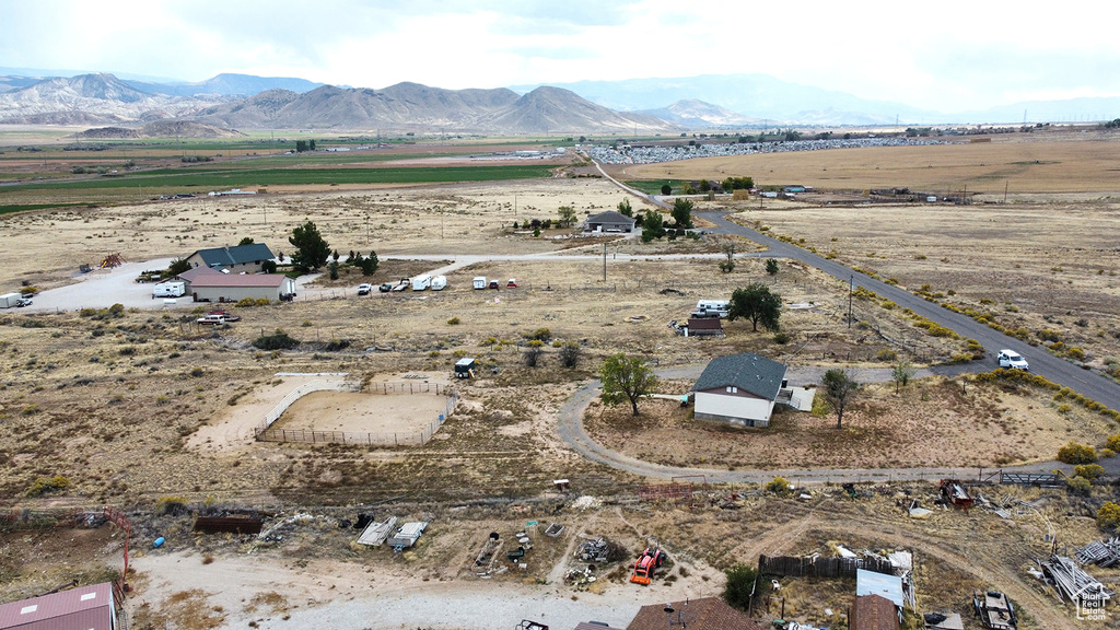 Birds eye view of property featuring a mountain view and a rural view