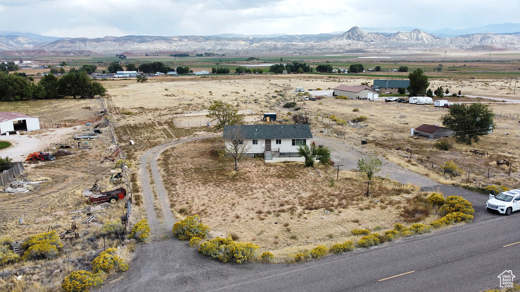 Drone / aerial view with a rural view and a mountain view