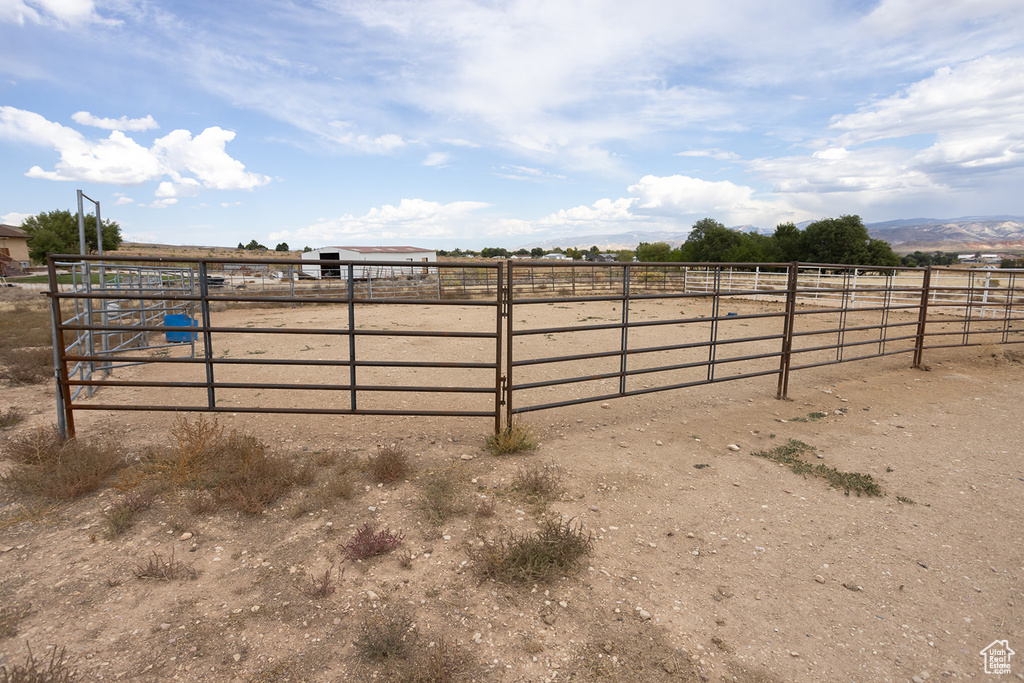 View of gate featuring a rural view