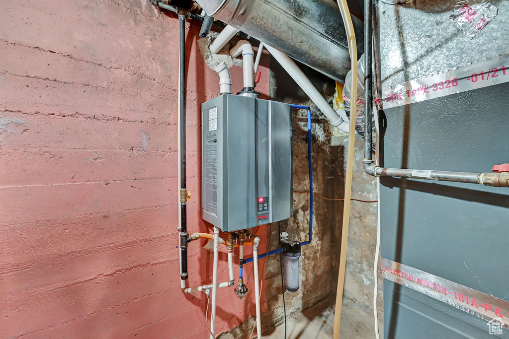 Utilities featuring tankless water heater