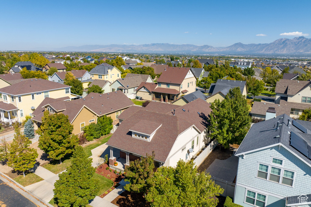 Birds eye view of property with a mountain view