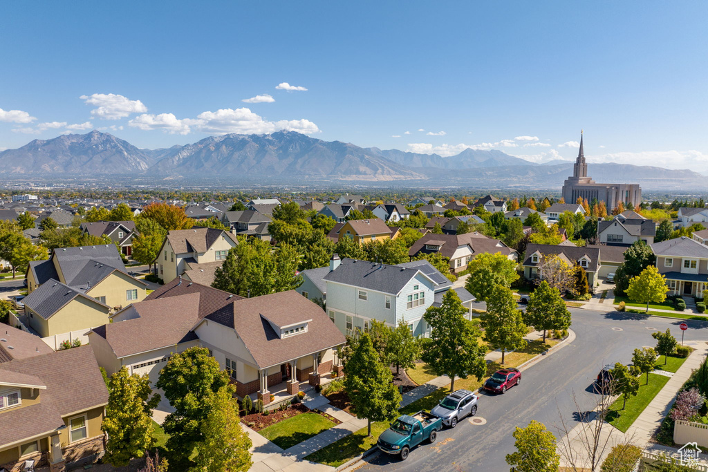 Birds eye view of property with a mountain view