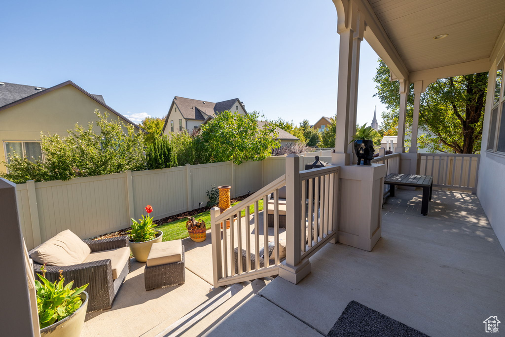 View of patio with an outdoor living space