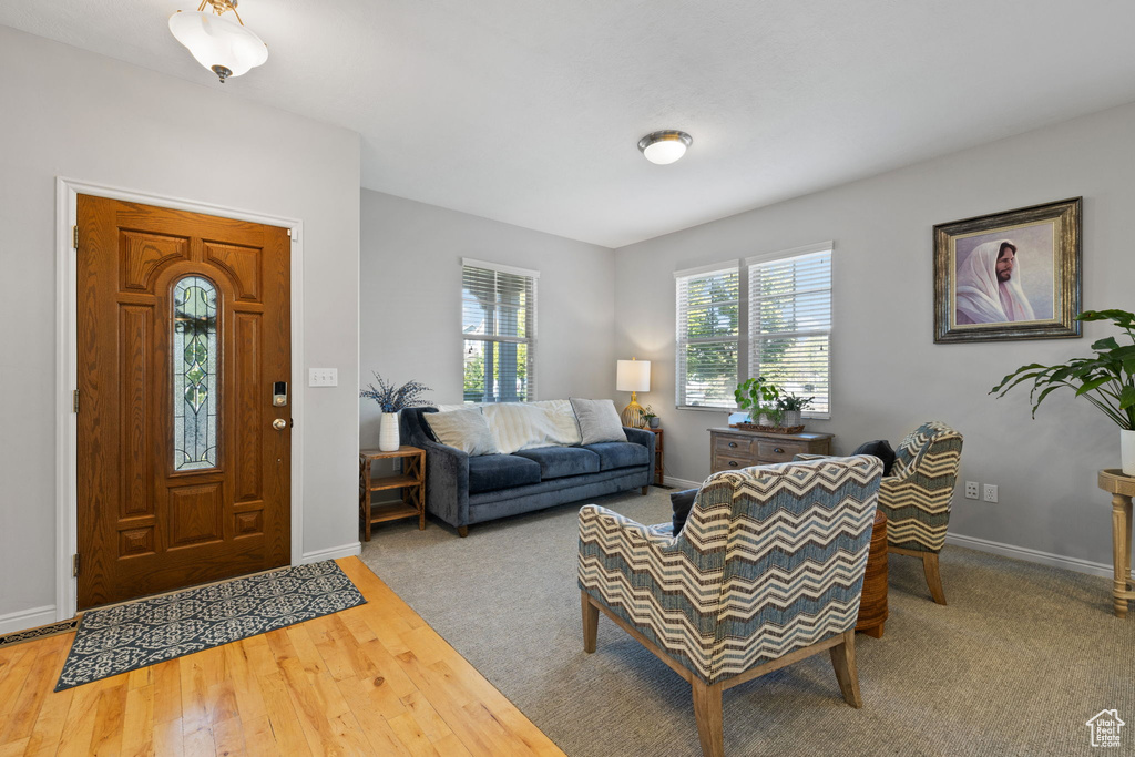 Living room with hardwood / wood-style floors