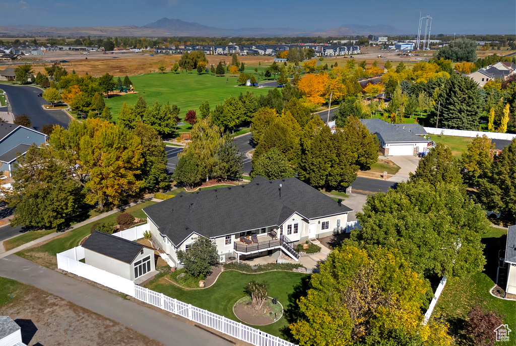 Birds eye view of property with a mountain view