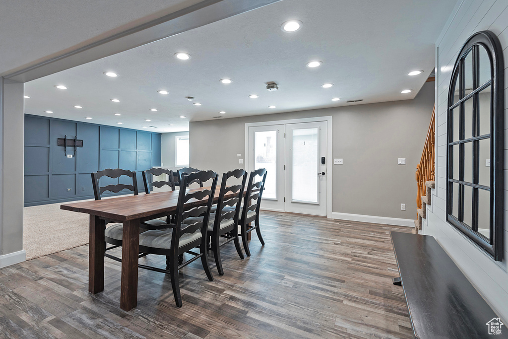 Dining area featuring dark wood-type flooring