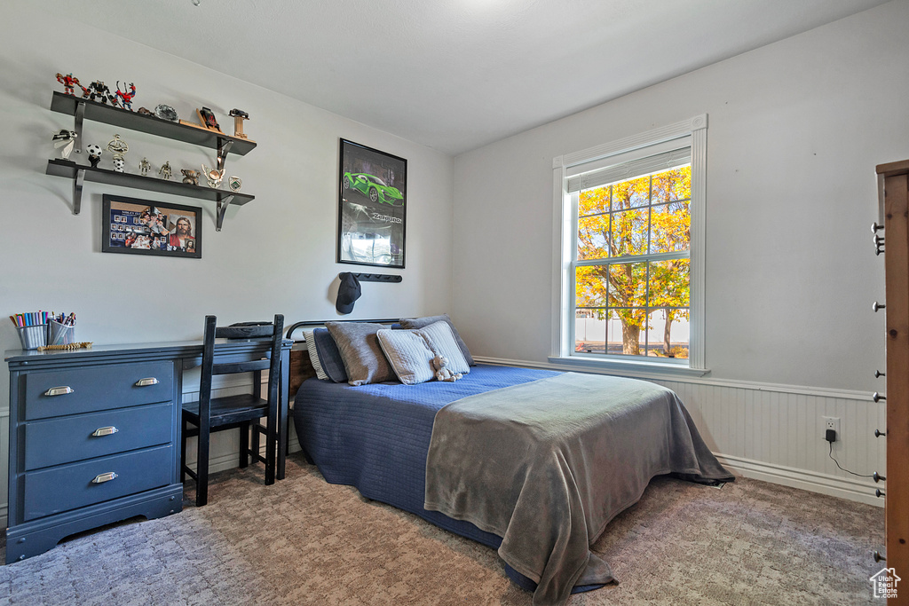 Bedroom with wood walls