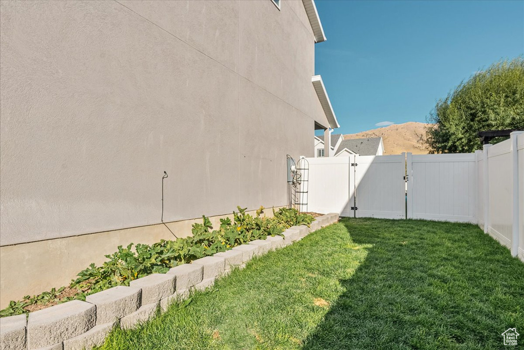 View of yard with a mountain view