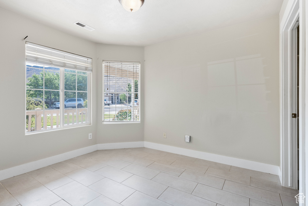 View of tiled spare room