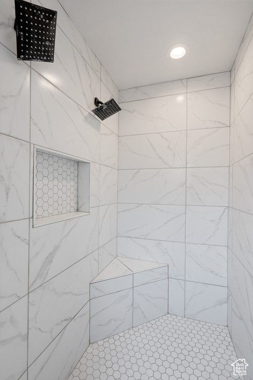 Bathroom with a tile shower