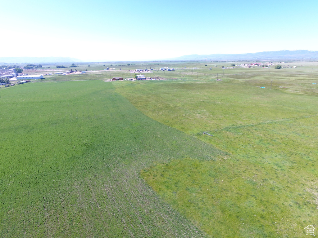 Birds eye view of property with a rural view