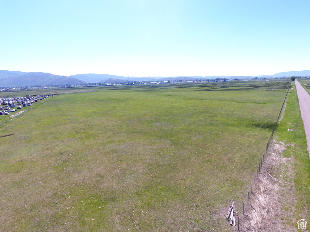 Birds eye view of property featuring a mountain view and a rural view