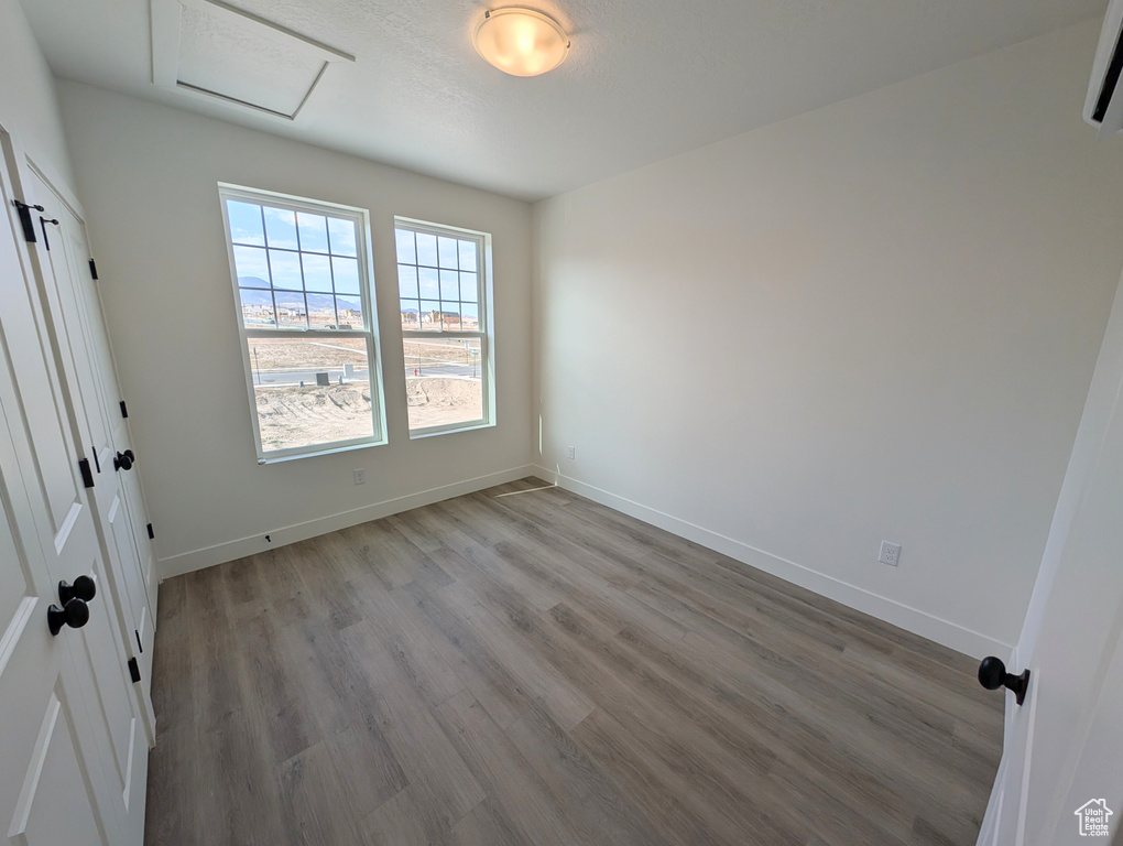 Spare room featuring light hardwood / wood-style flooring