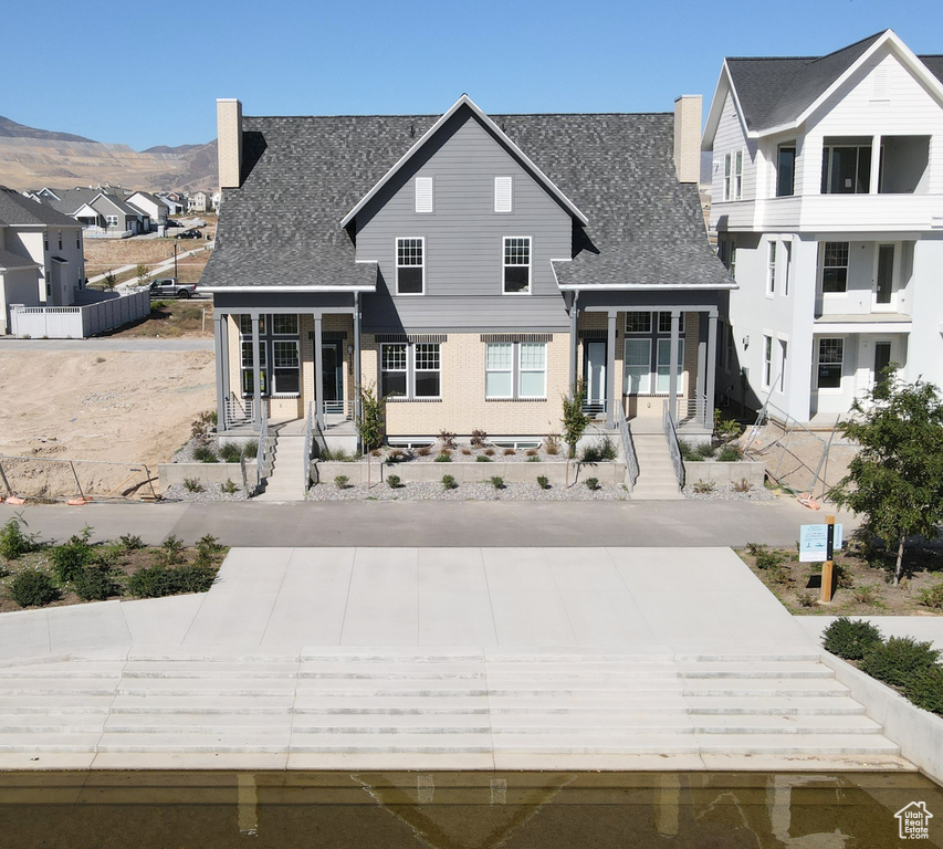 View of front property featuring a mountain view