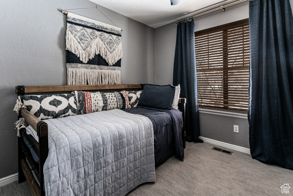 View of carpeted bedroom